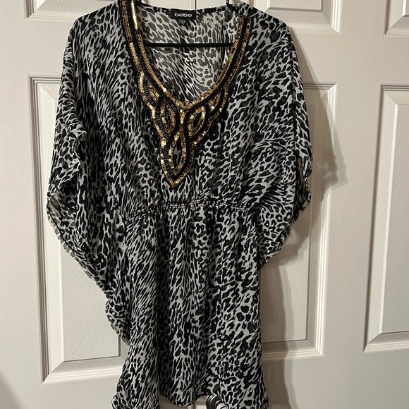 Ladies size Small Bebe top. - Picture 1 of 5